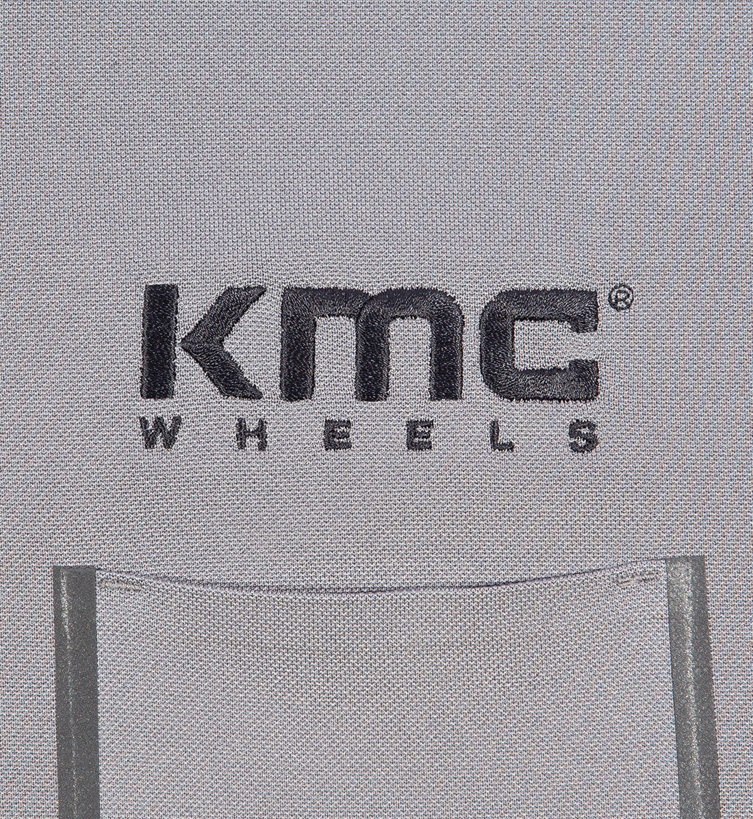 KMC Wheel grey short sleeve polo shirt with embroidered logo on the chest.