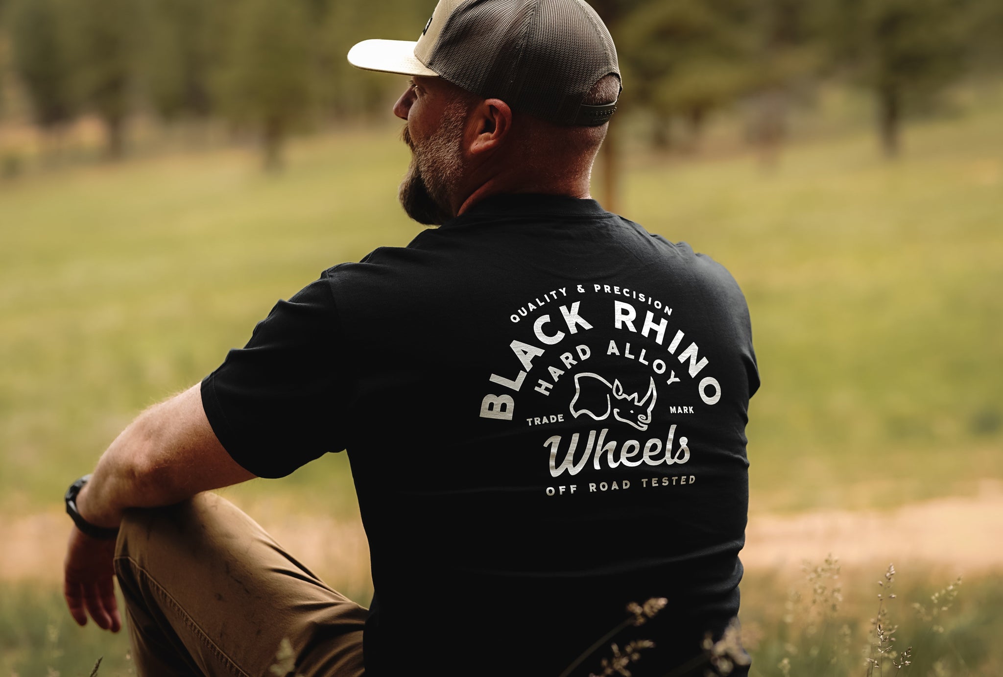 Black Rhino FLYER Short Sleeve Tee in black featuring a bold graphic design on the front.