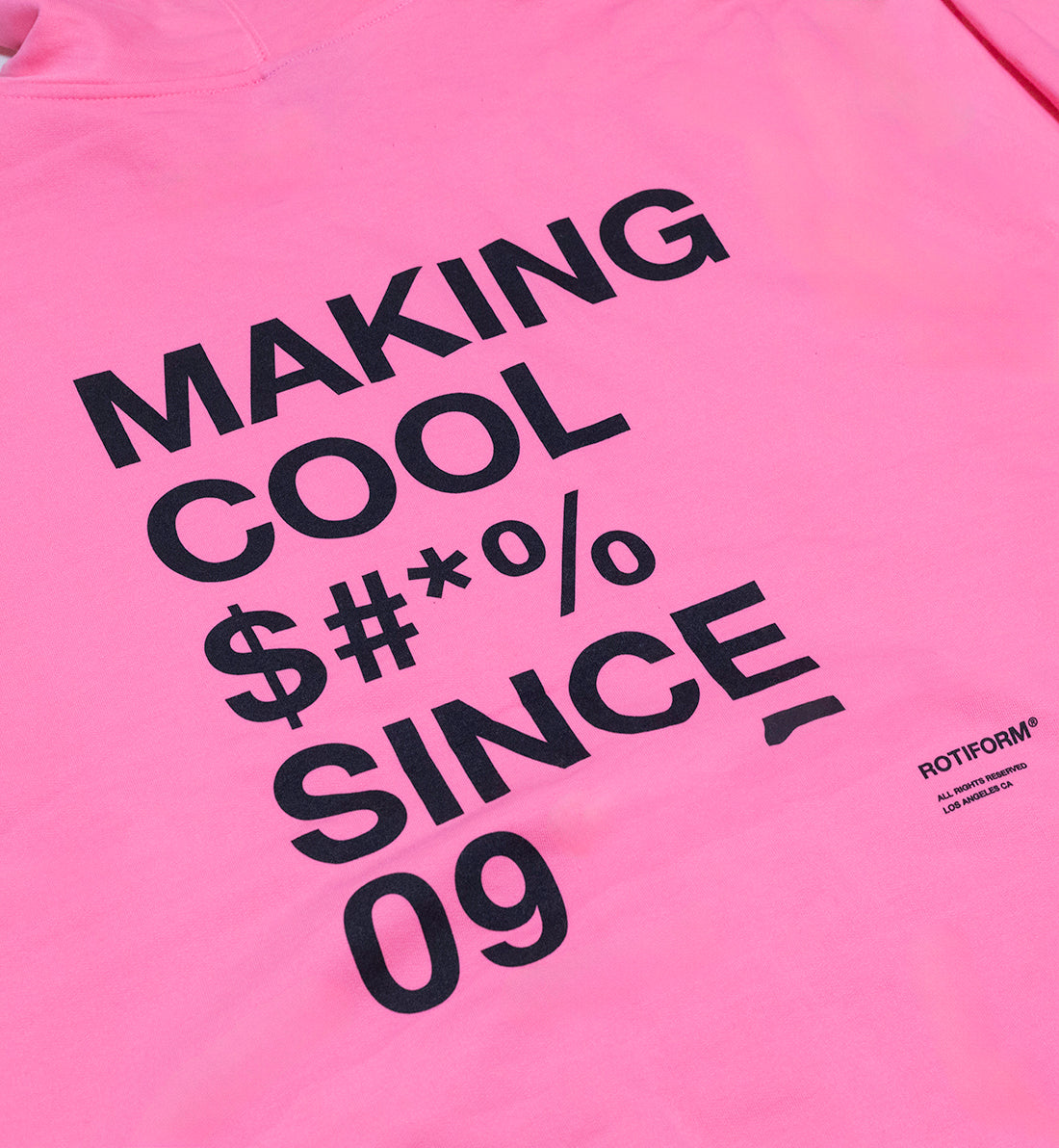 Black hoodie featuring "Rotiform MAKING COOL $#*&" graphic on the front.