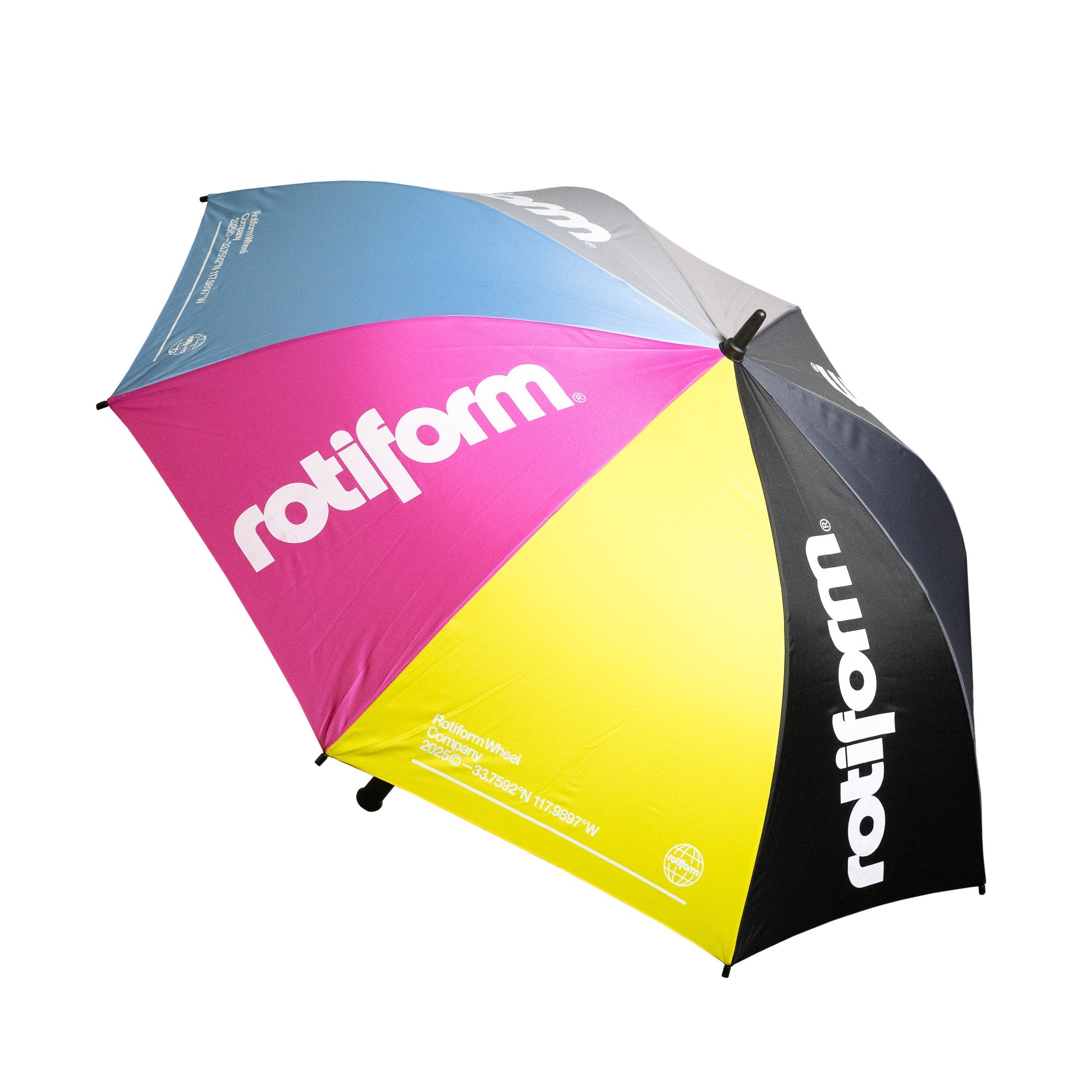 Colorful Rotiform SHADE SEEKER umbrella featuring a vibrant design with blue, pink, yellow, and black panels.