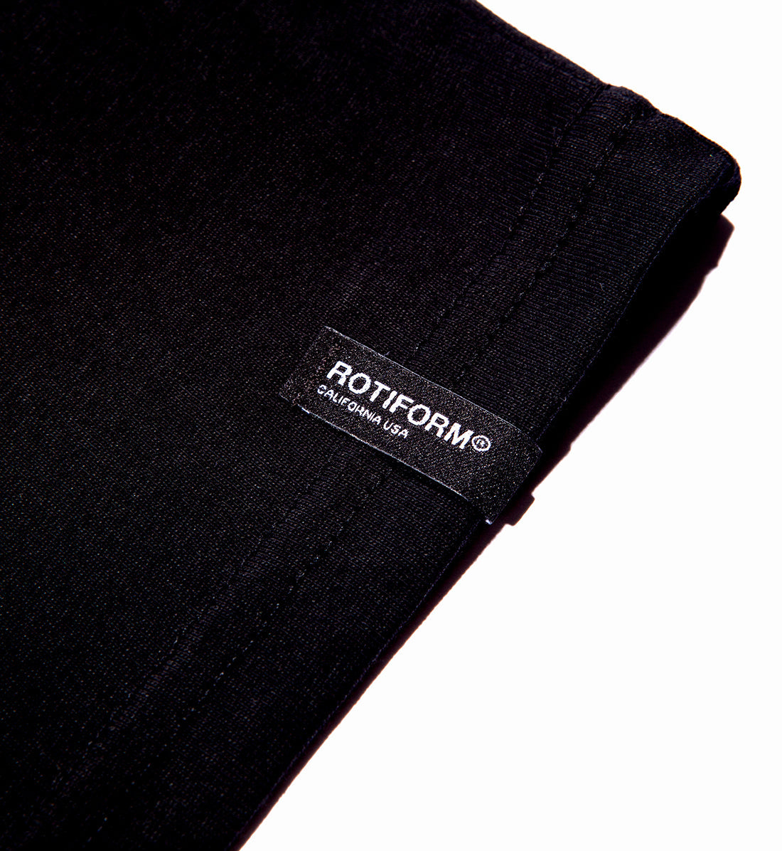 Black Rotiform FAST OR LAST short sleeve tee featuring a bold white logo and label detail.