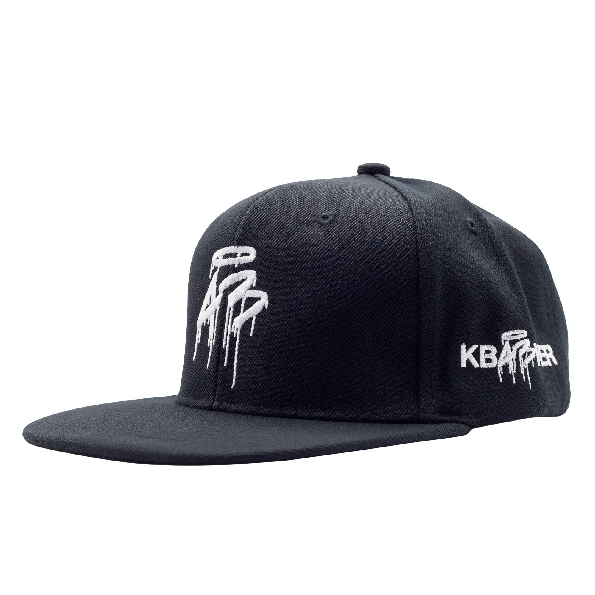 Black snapback hat with white embroidered "KB43VER" logo and dripping design on the front and side panels.