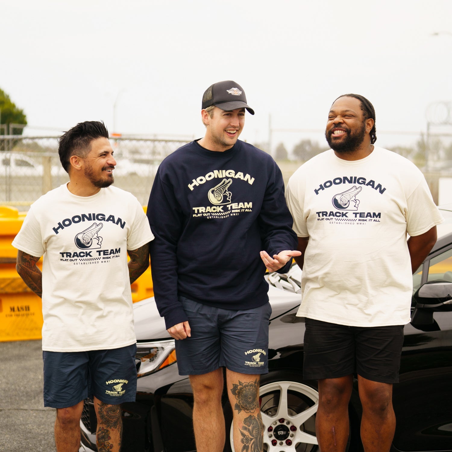 Hoonigan TRACK TEAM athletic shorts in black with white logo, designed for comfort and performance.