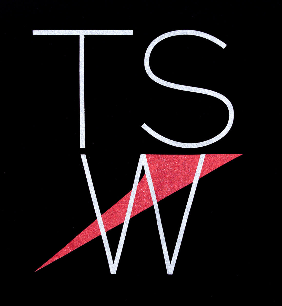 TSW Thin Logo Short Sleeve Tee in black, showcasing a close-up of the back detail with subtle logo design.