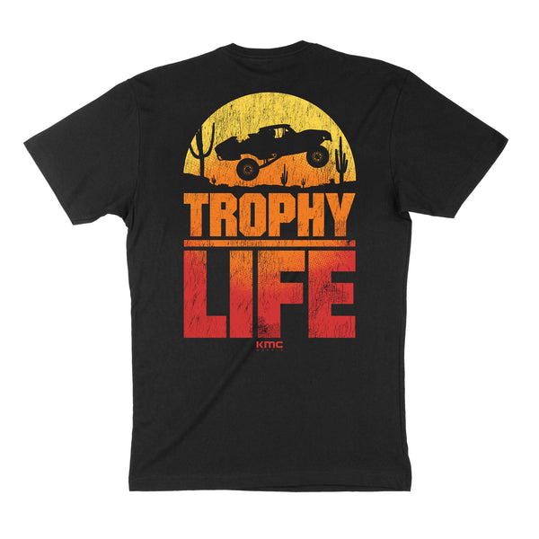 Black short sleeve t-shirt featuring a vibrant graphic of a truck and "TROPHY LIFE" text, perfect for motorsport enthusiasts.