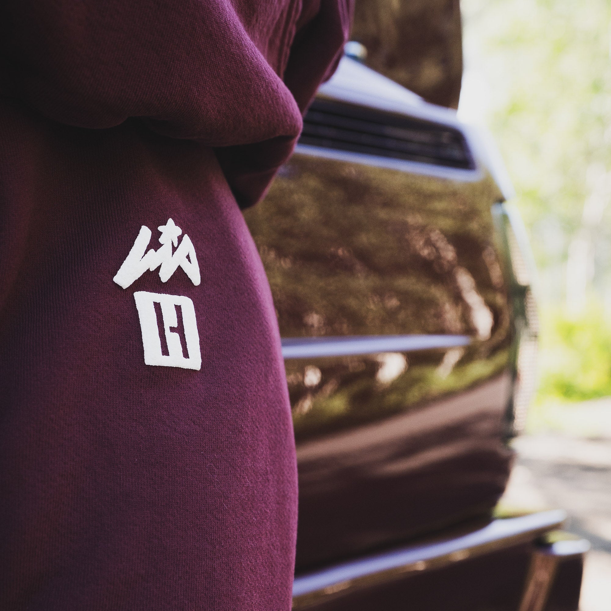 Hoonigan x Lia Block UR STAR Sweatpants featuring a bold logo on the thigh, perfect for motorsport enthusiasts.