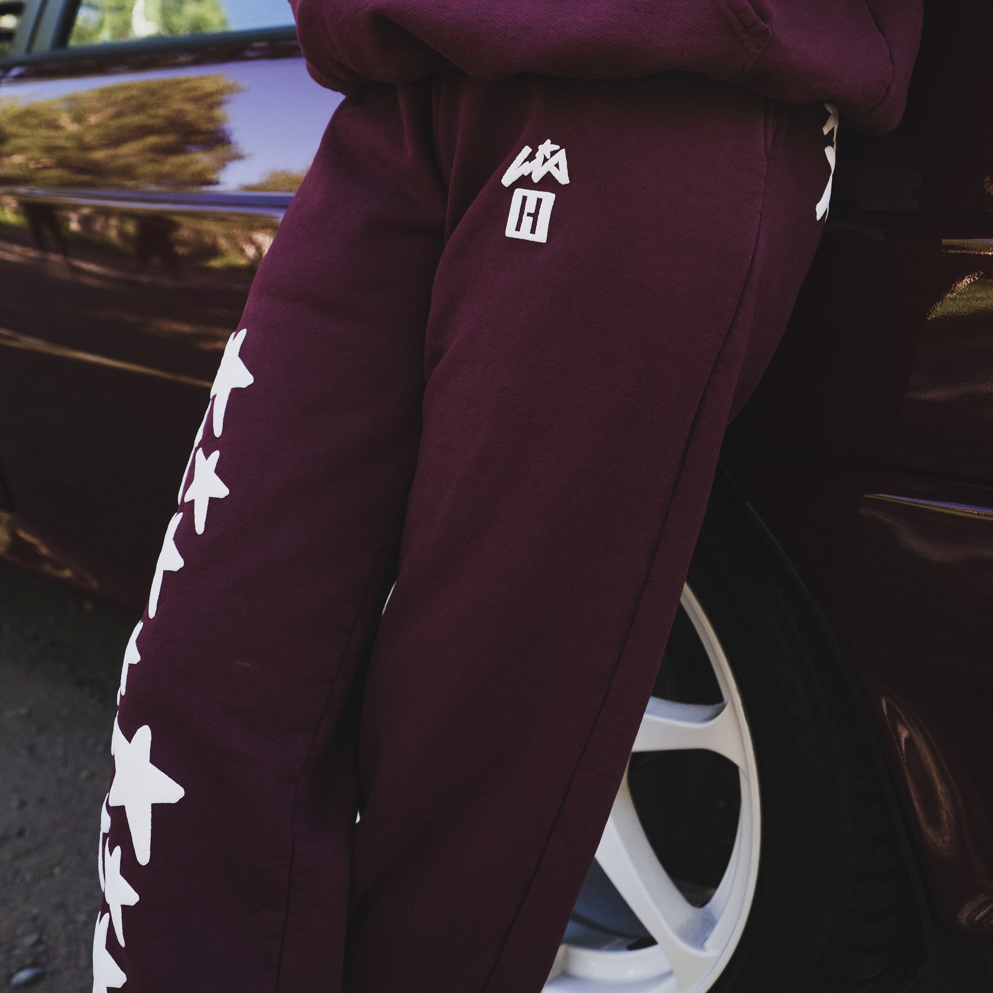 Hoonigan x Lia Block UR STAR Sweatpants featuring a bold star design and logo, perfect for motorsport enthusiasts.
