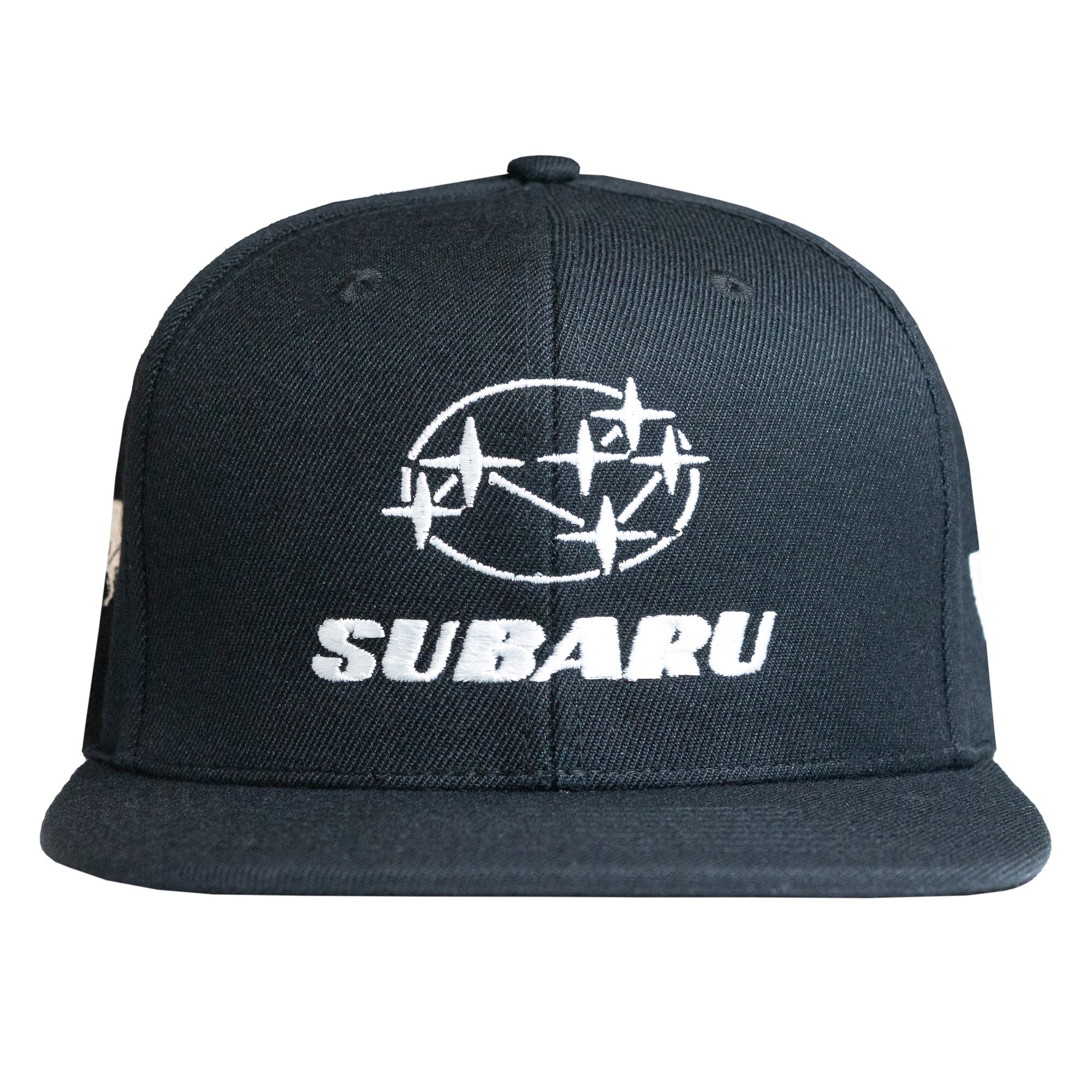 Black snapback hat featuring the Subaru logo and "SUBARU" embroidered in bold white letters, perfect for motorsport enthusiasts.