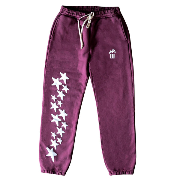 Hoonigan x Lia Block UR STAR Sweatpants in burgundy with white star graphics and elastic waistband for comfort.