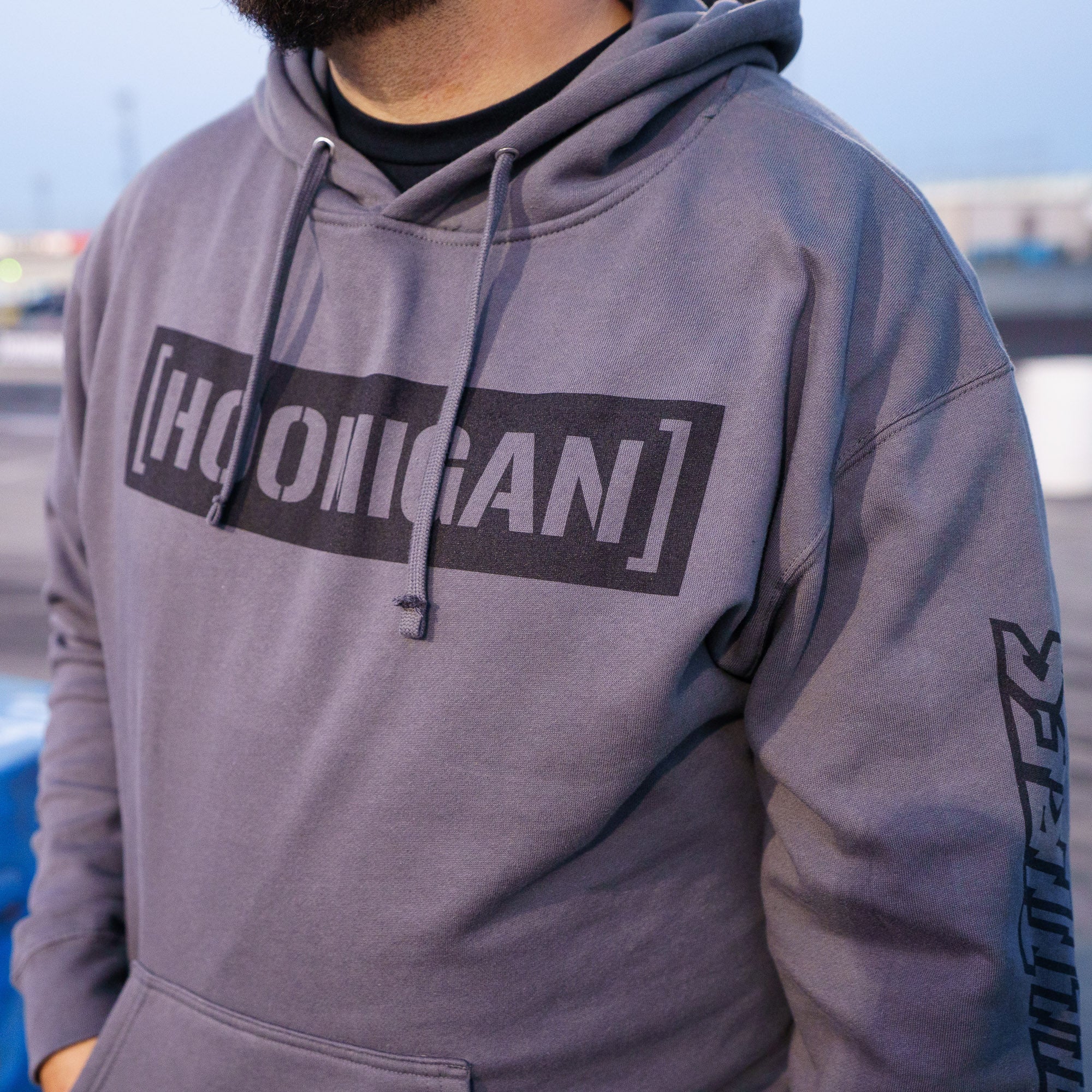 Hoonigan CENSOR BAR KILL ALL TIRES pullover hoodie in gray, featuring bold black logo on the front and sleeve.