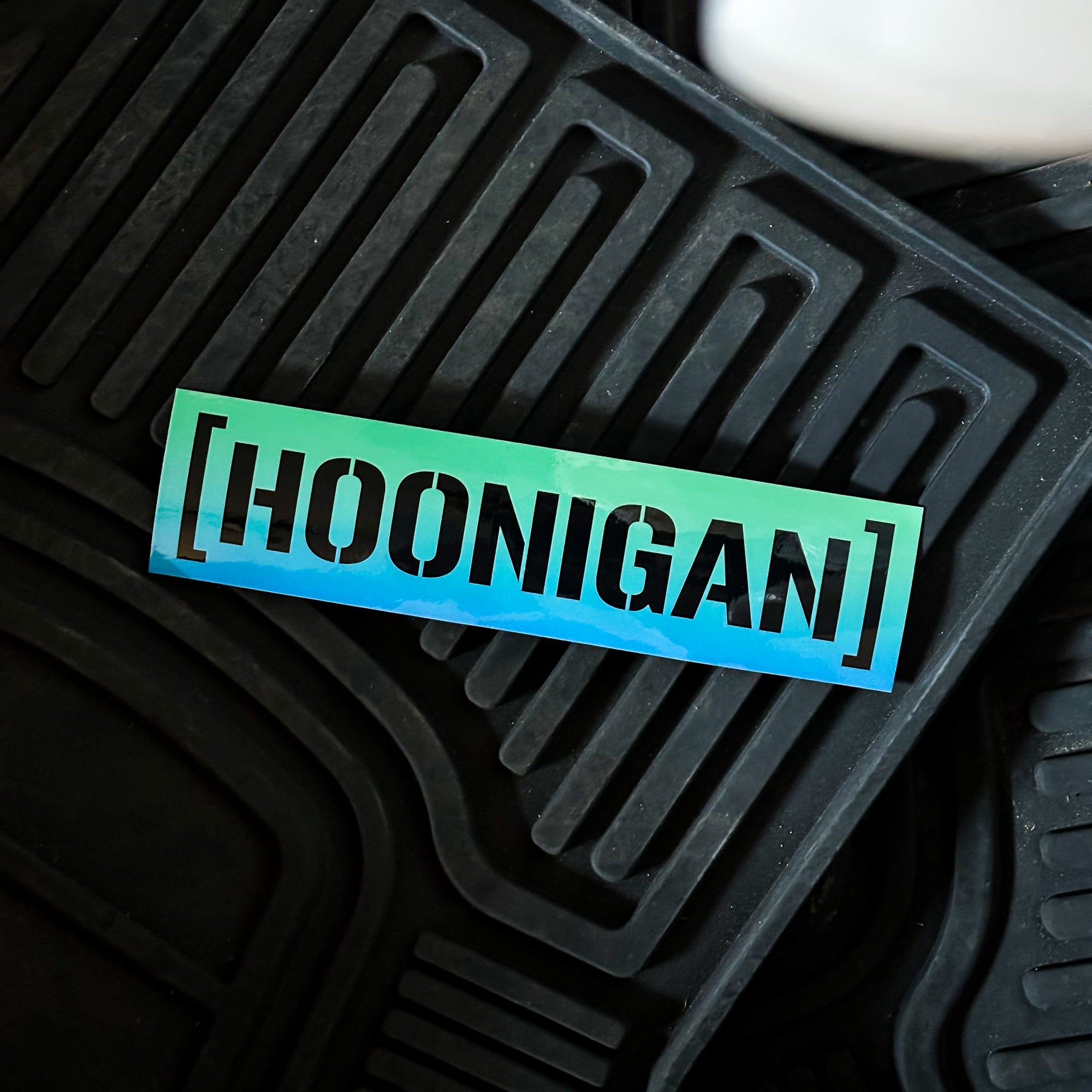 Hoonigan SHIFT CENSOR BAR sticker in gradient colors, designed for automotive enthusiasts and car culture fans.