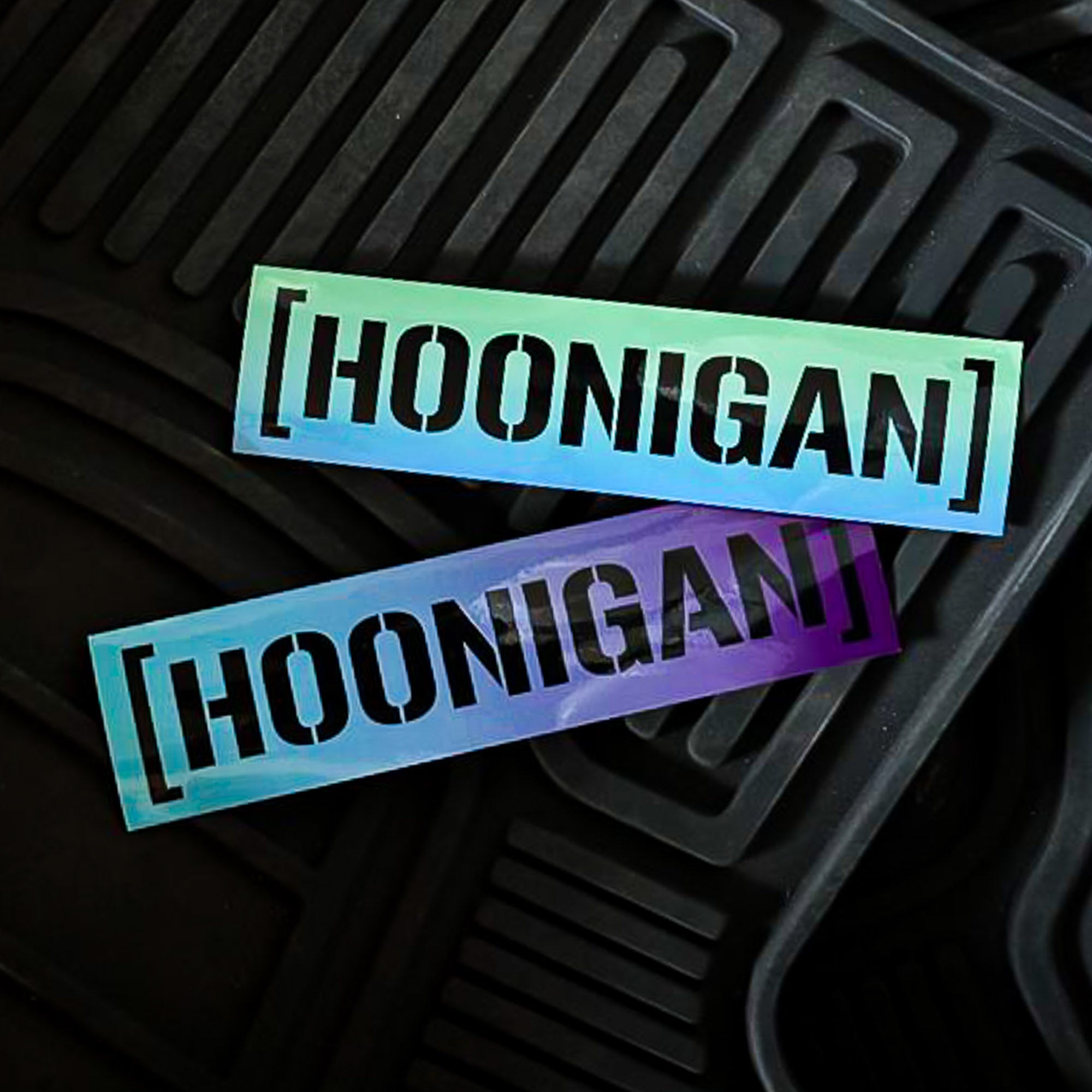 Hoonigan SHIFT CENSOR BAR Sticker in iridescent colors, featuring bold black lettering on a reflective background.