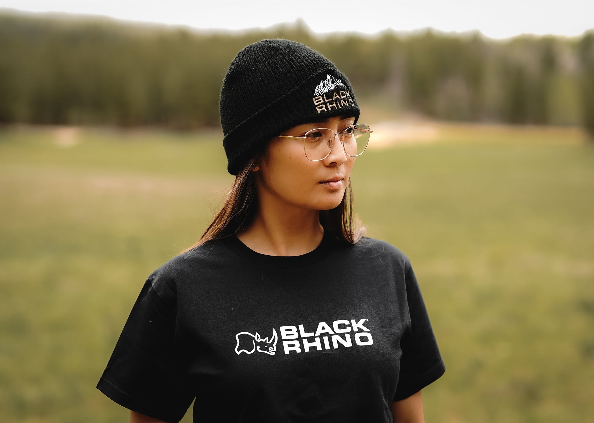 Black Rhino short sleeve tee in a classic black color, featuring a bold graphic design on the front.