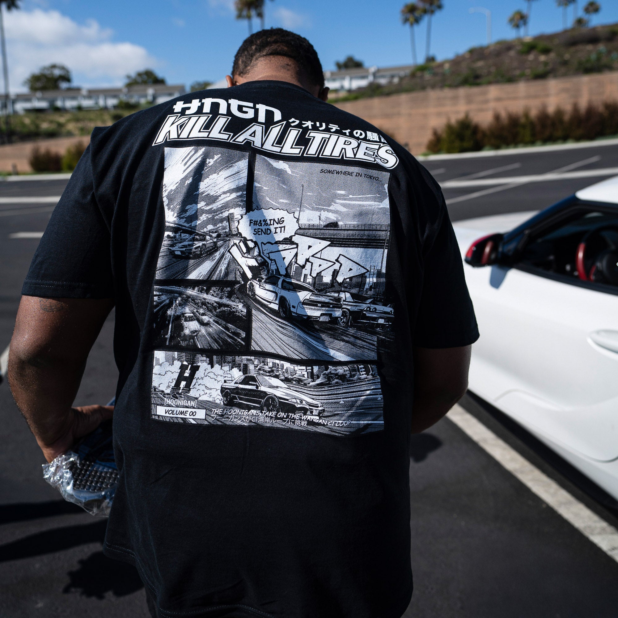 Hoonigan WANGAN C1 Short Sleeve Tee featuring a bold graphic design on the back, showcasing car culture and aggressive driving.