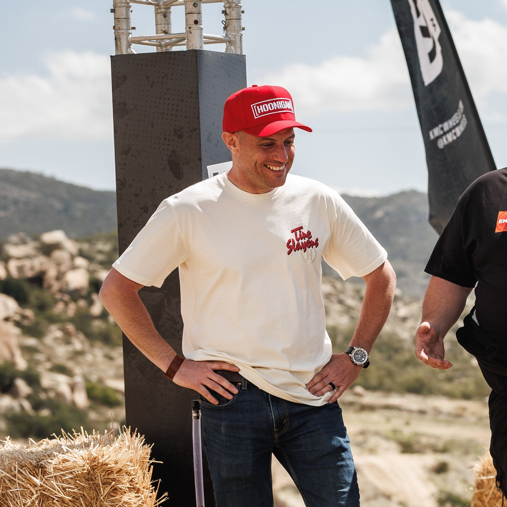Hoonigan MAYHEM ROAD Short Sleeve Tee in black with bold graphic design, featuring racing-inspired motifs on the front and back.
