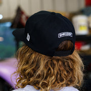 Black snapback hat featuring "SHREDDY" logo, designed for motorsport enthusiasts and aggressive driving fans.