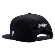 Black snapback hat featuring Hoonigan and Shreddy logos, designed for motorsport enthusiasts and streetwear lovers.