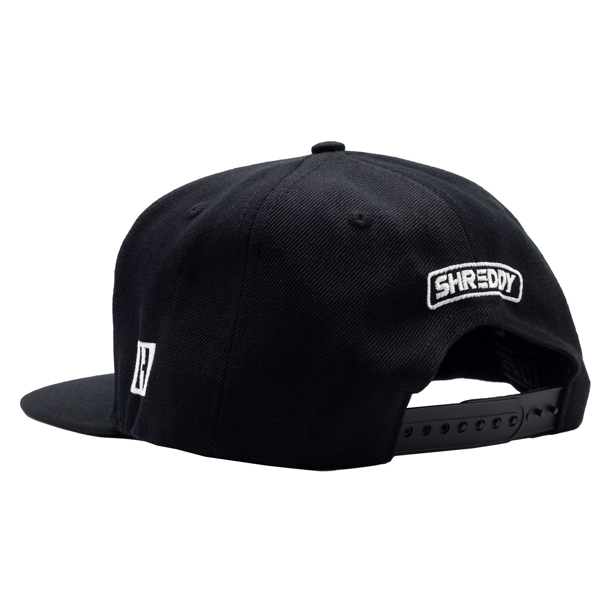 Black snapback hat featuring Hoonigan and Shreddy logos, designed for motorsport enthusiasts and streetwear lovers.
